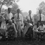 Henry Ford, Thomas Edison, President Warren G. Harding, and Harvey Firestone with others, camping